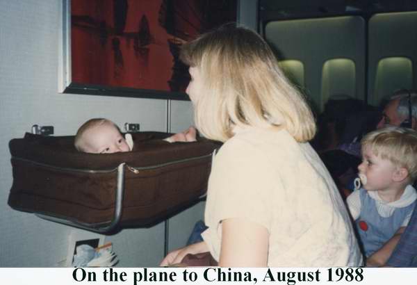 Susan Matthew (in basket) and Shannon on the plane to Hong Kong in August 1988 (Matt was five months old)